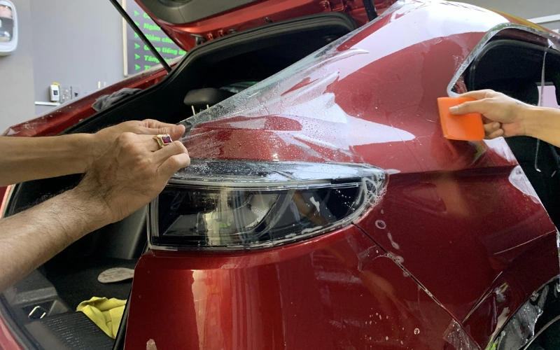 Lợi ích của việc dán PPF bảo vệ sơn Helioz xe Limo Green